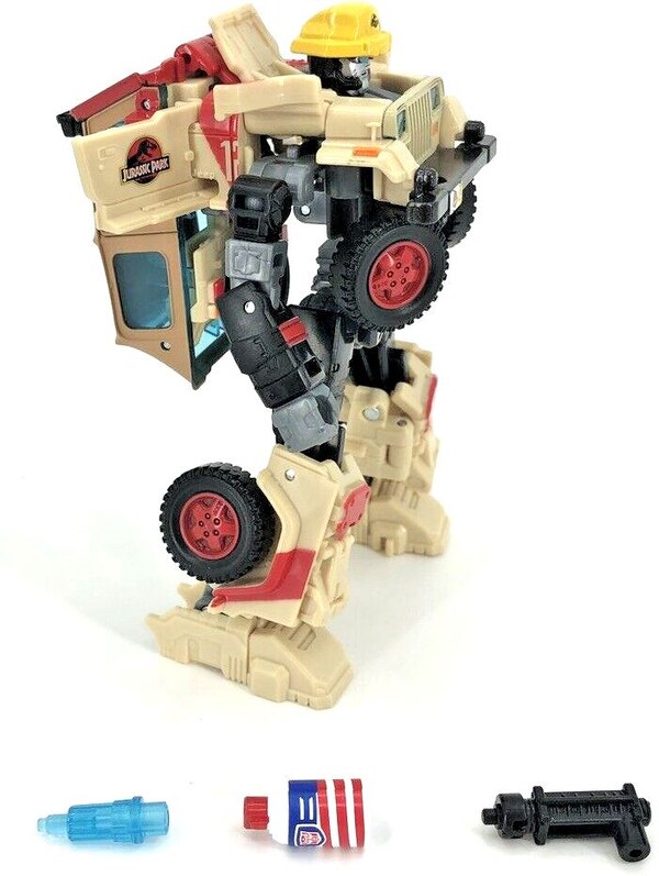 Image Of Autobot JP12 Dennis Nedry From Transformers X Jurassic Park Collaborative  (4 of 12)